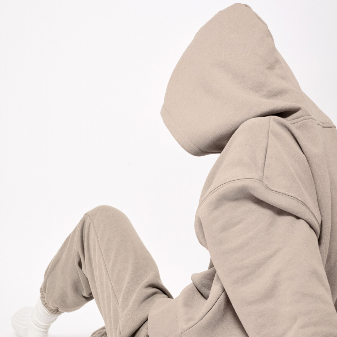 Neutral colored hoodie infused with calming essential oils for aromatherapy and stress relief